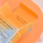 Afbeelding van TMG supplementen met vitamines en gezonde producten voor optimale lichaamsfuncties.